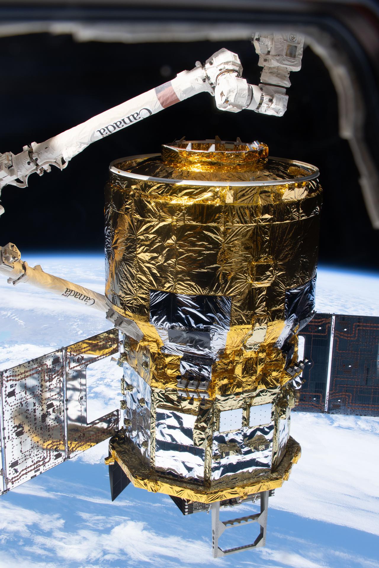 The HTV‑X1 cargo spacecraft from JAXA (Japan Aerospace Exploration Agency) is in the grasp of the Canadarm2 robotic arm after being detached from the Earth‑facing port on the International Space Station’s Harmony module. The orbital outpost was soaring 274 miles above the Pacific Ocean off the coast of South America’s Patagonia region at the time of this photograph.