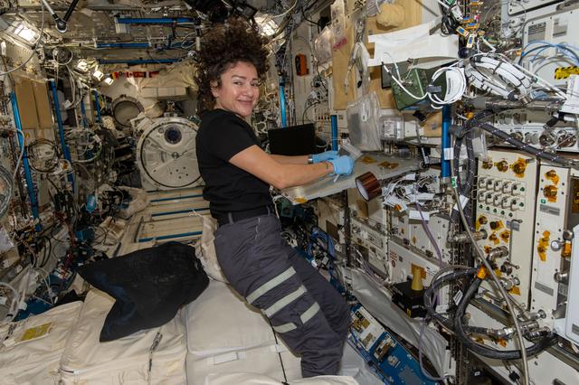 NASA image: NASA astronaut Jessica Meir processes samples for the StarSteel experiment