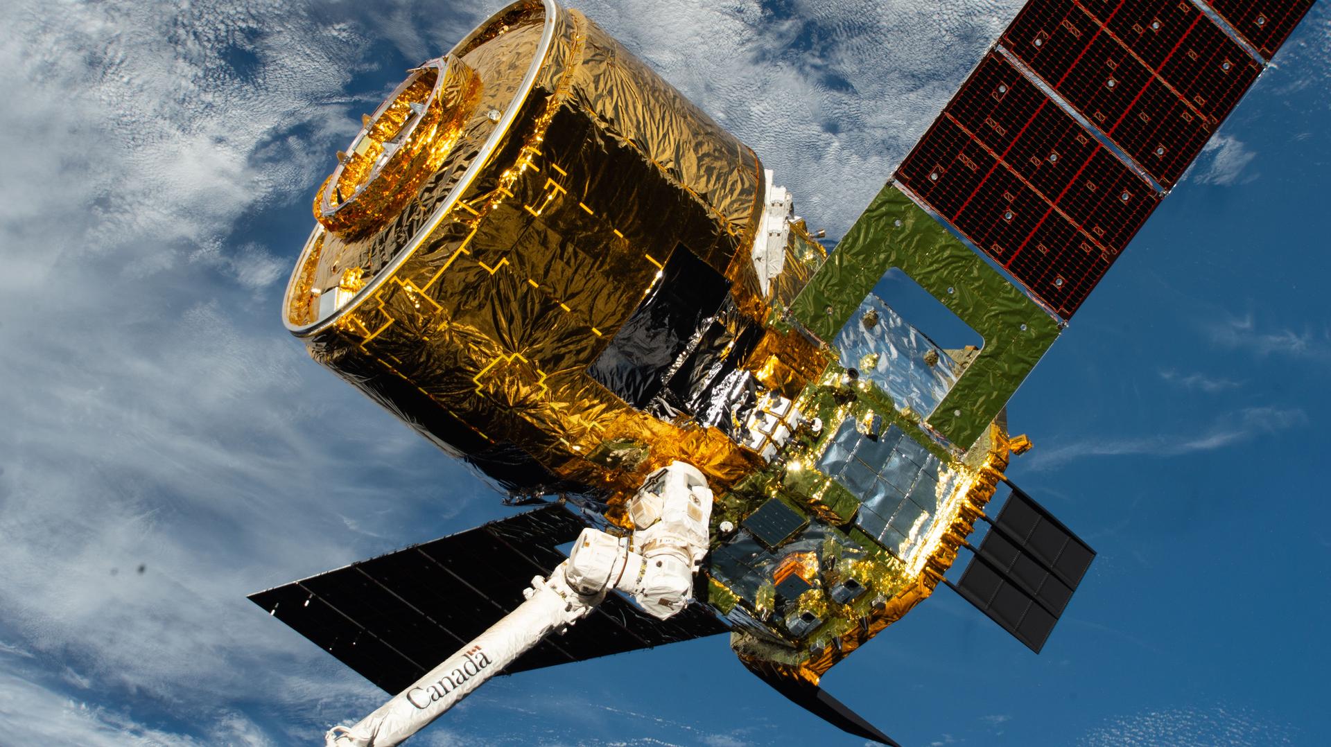 The HTV‑X1 cargo spacecraft from JAXA (Japan Aerospace Exploration Agency) is grasped by the Canadarm2 robotic arm as the International Space Station orbits 271 miles above the Indian Ocean, off the coast of South Africa. Moments later, Canadarm2 would release HTV‑X1 into Earth orbit, completing the spacecraft’s four‑month stay attached to the orbital outpost’s Harmony module.