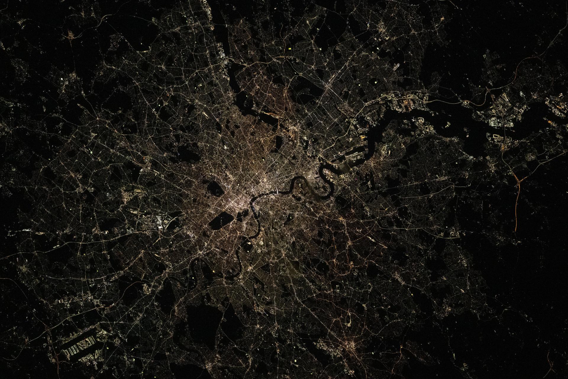 London, England, with a metropolitan population of nearly 10 million, is split by the River Thames in this nighttime photograph taken from the International Space Station as it orbited 266 miles above Europe. London’s Heathrow Airport is visible at the bottom left.