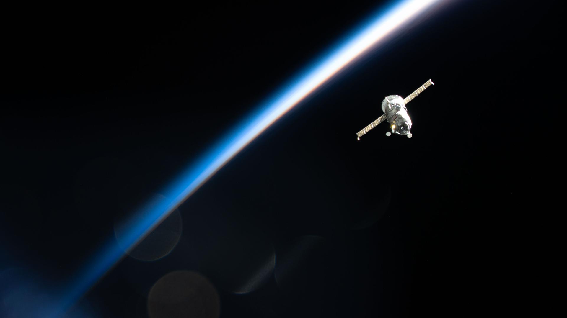 The Progress 92 cargo spacecraft from Roscosmos departs the International Space Station while soaring into an orbital sunset 267 miles above the Russia–Mongolia border.