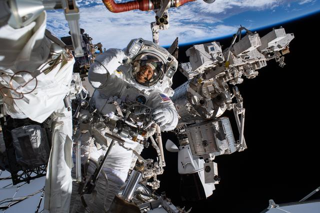 NASA image: NASA astronaut Chris Williams smiles at the camera during a spacewalk