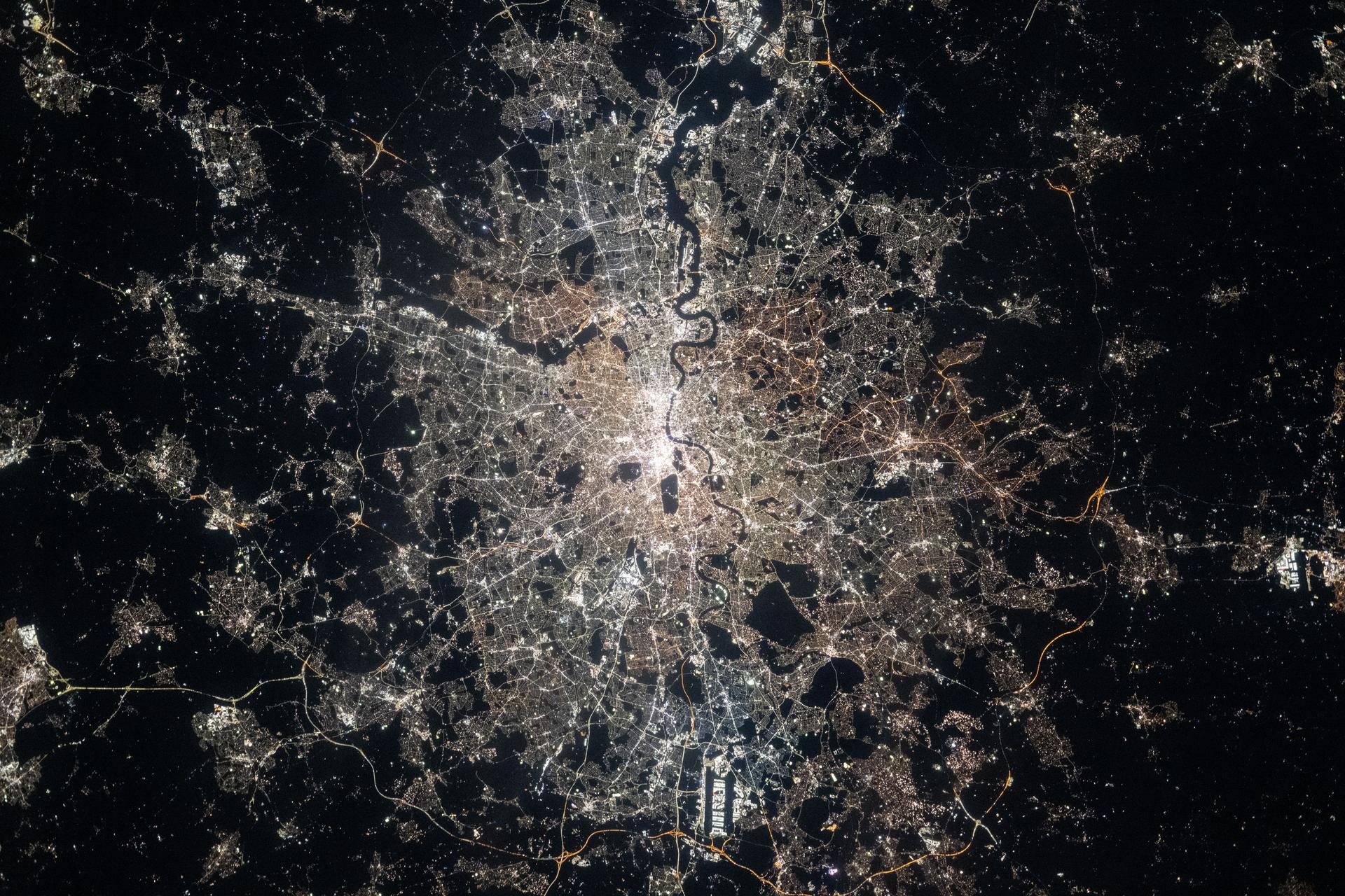 London, England, with a metropolitan population of nearly 10 million, is split by the River Thames in this nighttime photograph taken from the International Space Station as it orbited 265 miles above Europe. London’s two main airports feature prominently, with Heathrow Airport at the bottom and London Gatwick Airport at the far right.