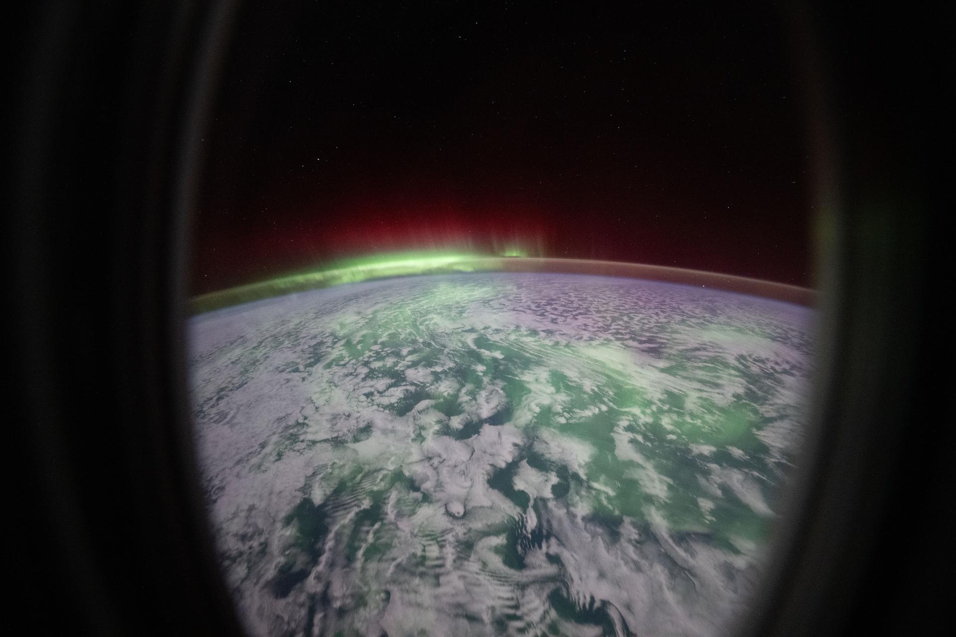 iss074e0436787 (April 3, 2026) --- This view from a window aboard the SpaceX Dragon spacecraft shows the aurora australis glowing above Earth’s atmosphere as the International Space Station soared 270 miles over the Indian Ocean, just southwest of the French Southern and Antarctic Lands. Credit: NASA/Chris Williams