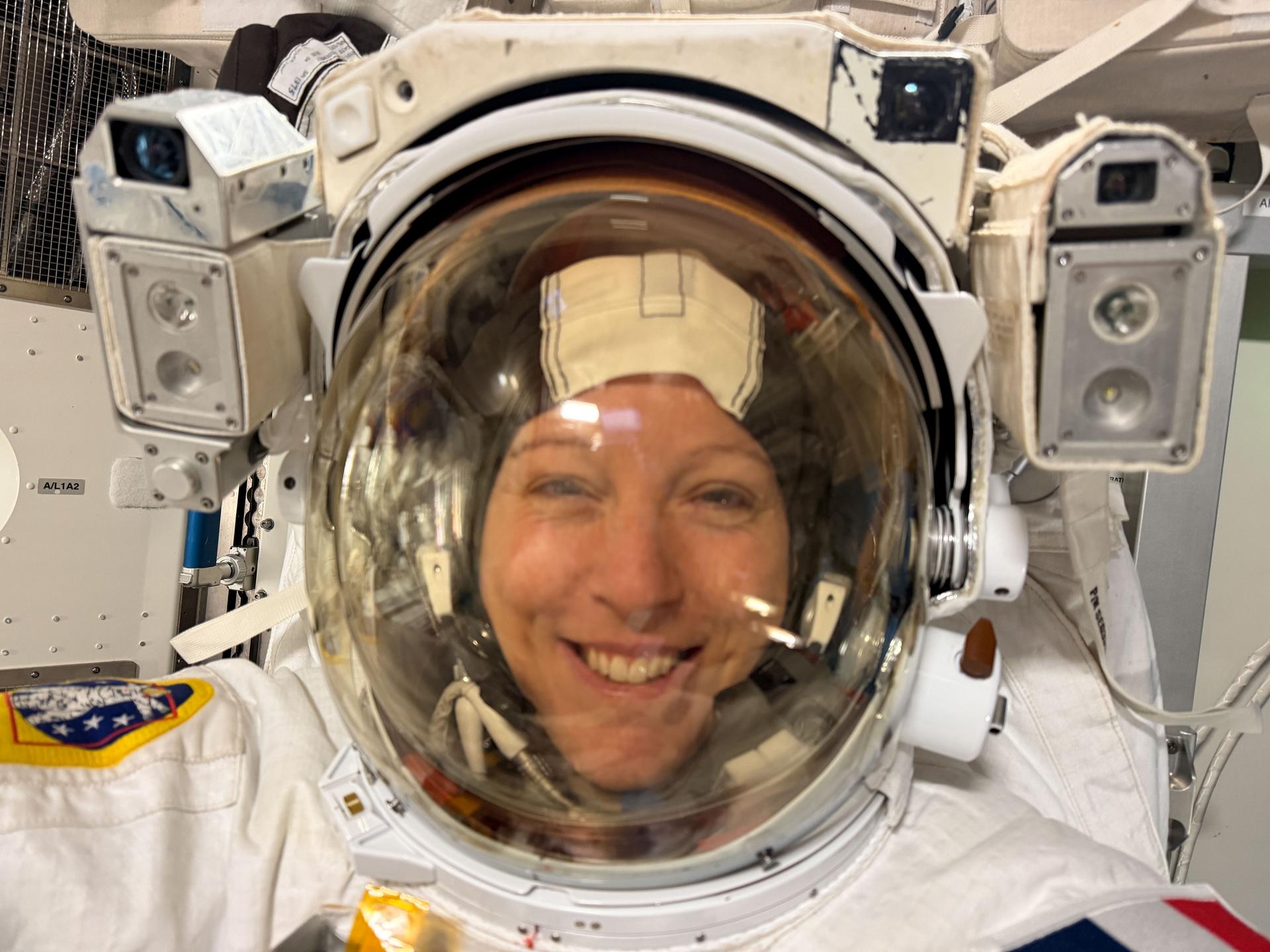 Expedition 74 flight engineer Sophie Adenot of ESA (European Space Agency) wears a spacesuit in a powered and pressurized configuration to verify its comfort, mobility, and functionality inside the International Space Station’s Quest airlock. Adenot also conducted suit leak and pressure checks while verifying the suit’s communications hardware and life-support systems.