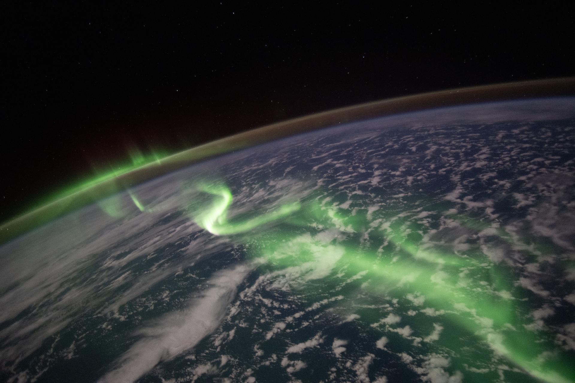 iss074e0462550 (April 4, 2026) --- The aurora australis arcs across the Indian Ocean south of Perth, Australia, in this photograph taken at approximately 2:19 a.m. local time from the International Space Station as it orbited 270 miles above Earth. Credit: NASA/Jessica Meir