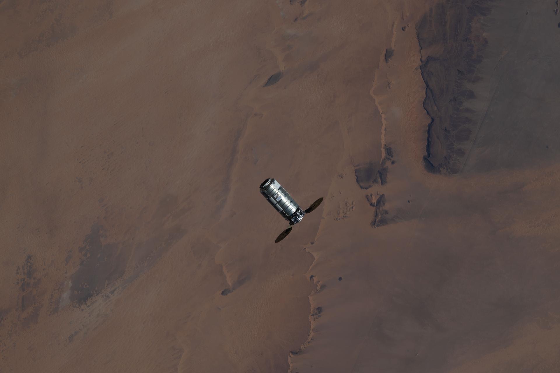 Northrop Grumman’s Cygnus XL cargo spacecraft approaches the International Space Station while orbiting 264 miles above the Sahara Desert in Mauritania.