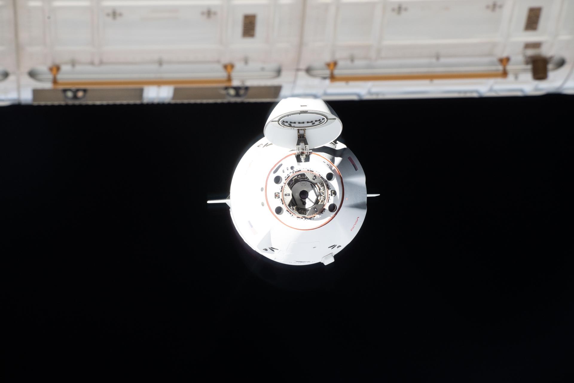 A SpaceX Dragon cargo spacecraft approaches the International Space Station
