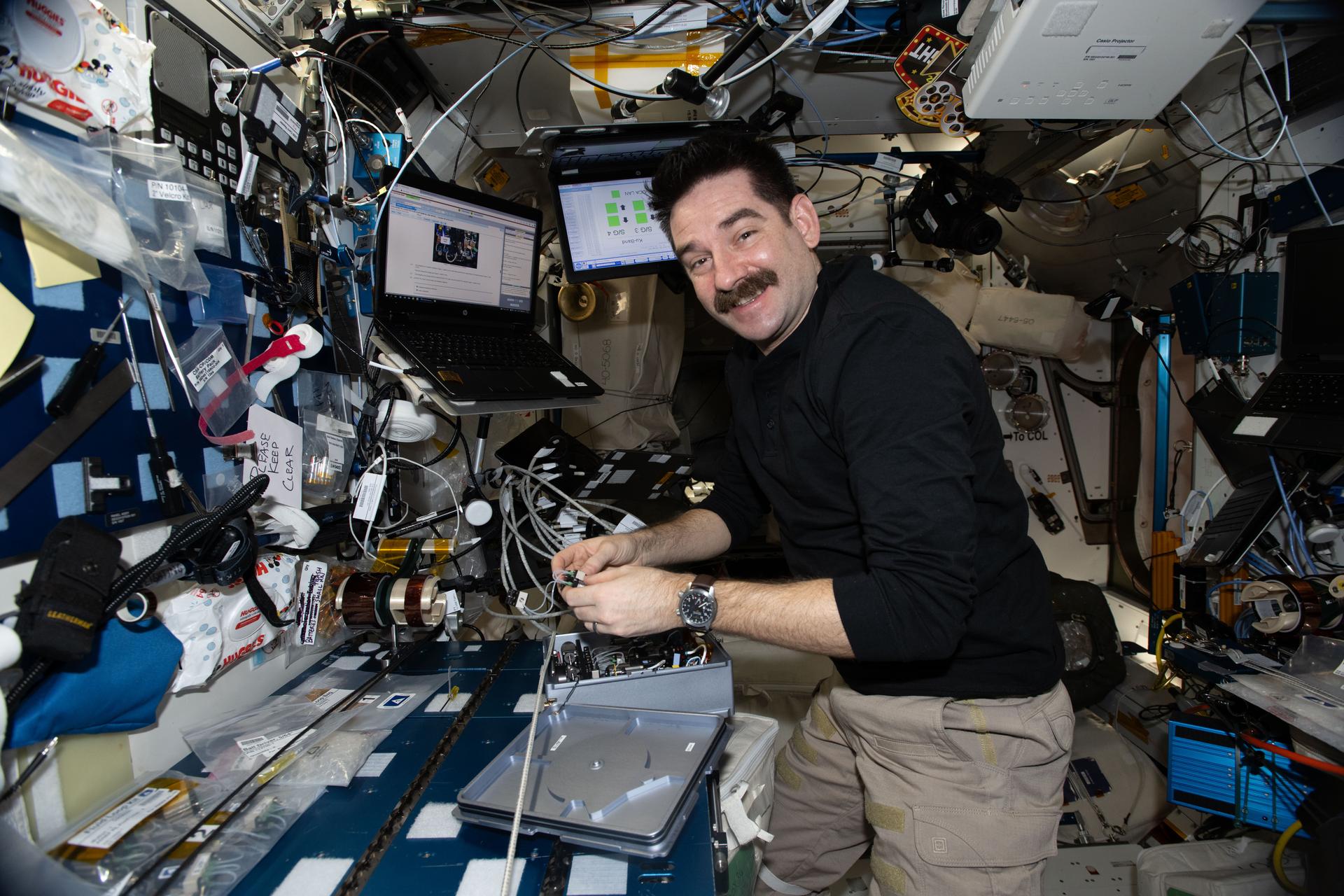 NASA astronaut and Expedition 74 flight engineer Jack Hathaway works inside the International Space Station’s Harmony module, swapping hardware inside the Advanced Space Experiment Processor‑2 to support a biotechnology study that explores the synthesis of pharmaceutical compounds. The investigation, called In‑Space Production Application–Pharmaceutical In‑Space Laboratory–02, studies the effect of microgravity on the production of a variety of crystals, potentially enhancing purity, improving stability, and creating uniform distribution.