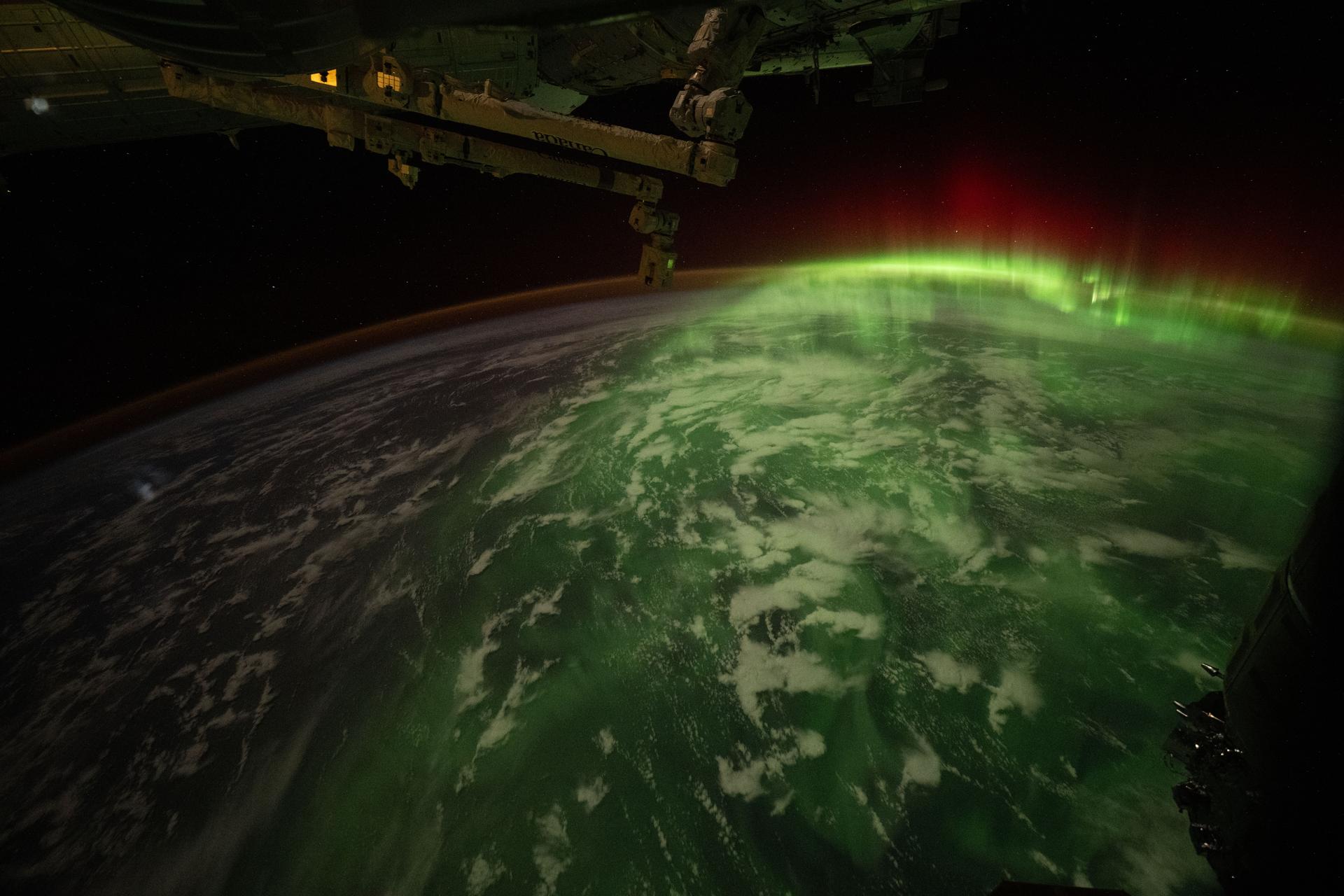 The aurora australis blankets Earth during an active solar event in this photograph taken at approximately 2:41 a.m. local time from the International Space Station as it orbited 273 miles above the Indian Ocean south of Tasmania, Australia’s island state.