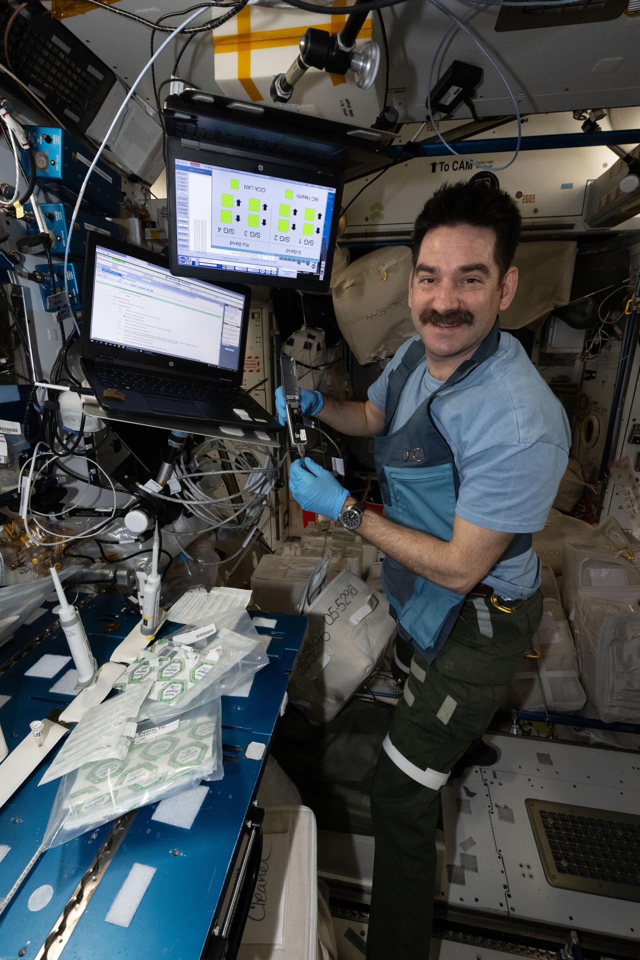 Crew Works Eye Exams, DNA Sequencing, and Spacesuit Jetpack Preps