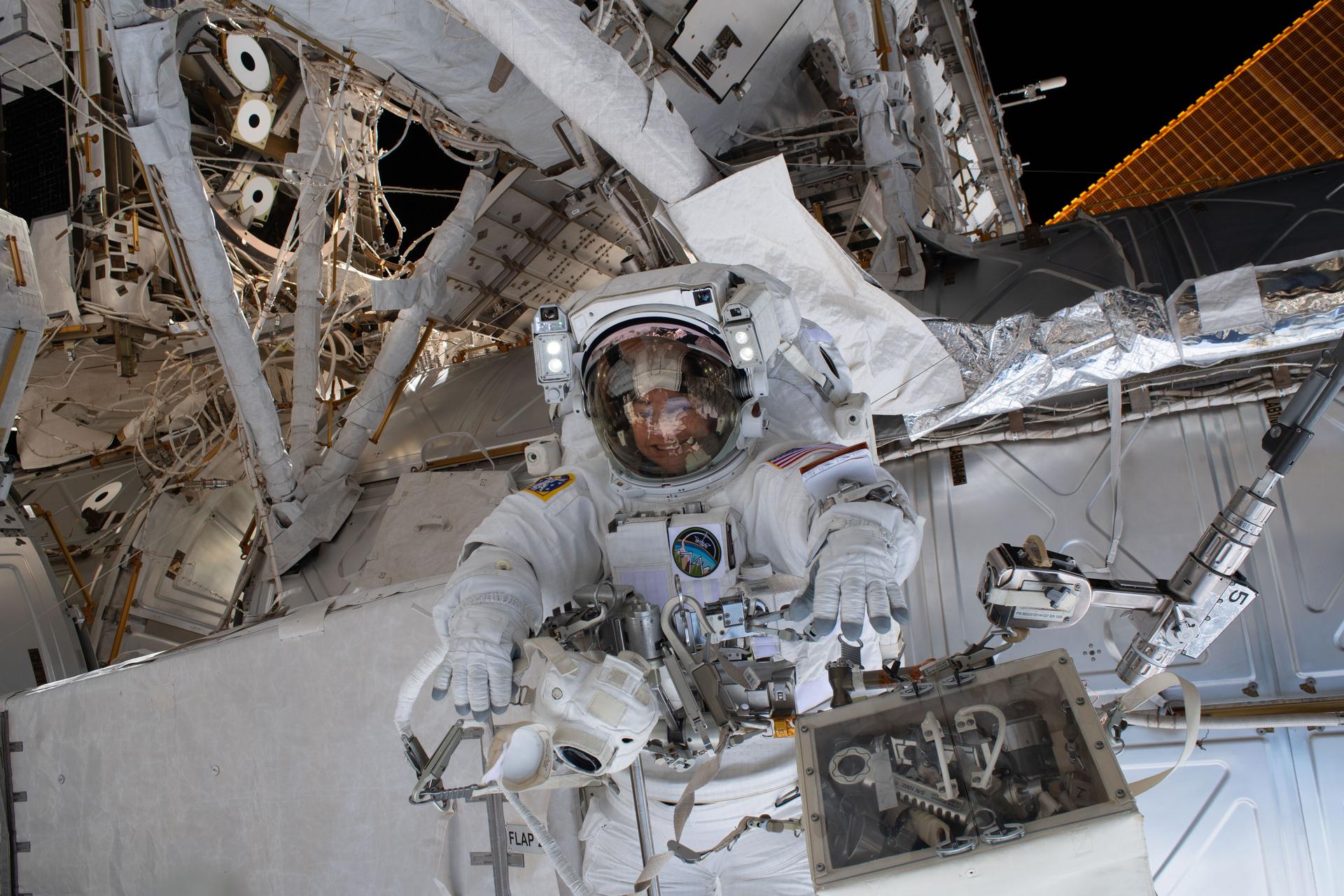 NASA astronaut and Expedition 74 flight engineer Jessica Meir is pictured outside of the International Space Station during a seven-hour-and-20-minute spacewalk to replace a malfunctioning wrist joint on the Canadarm2 robotic arm.