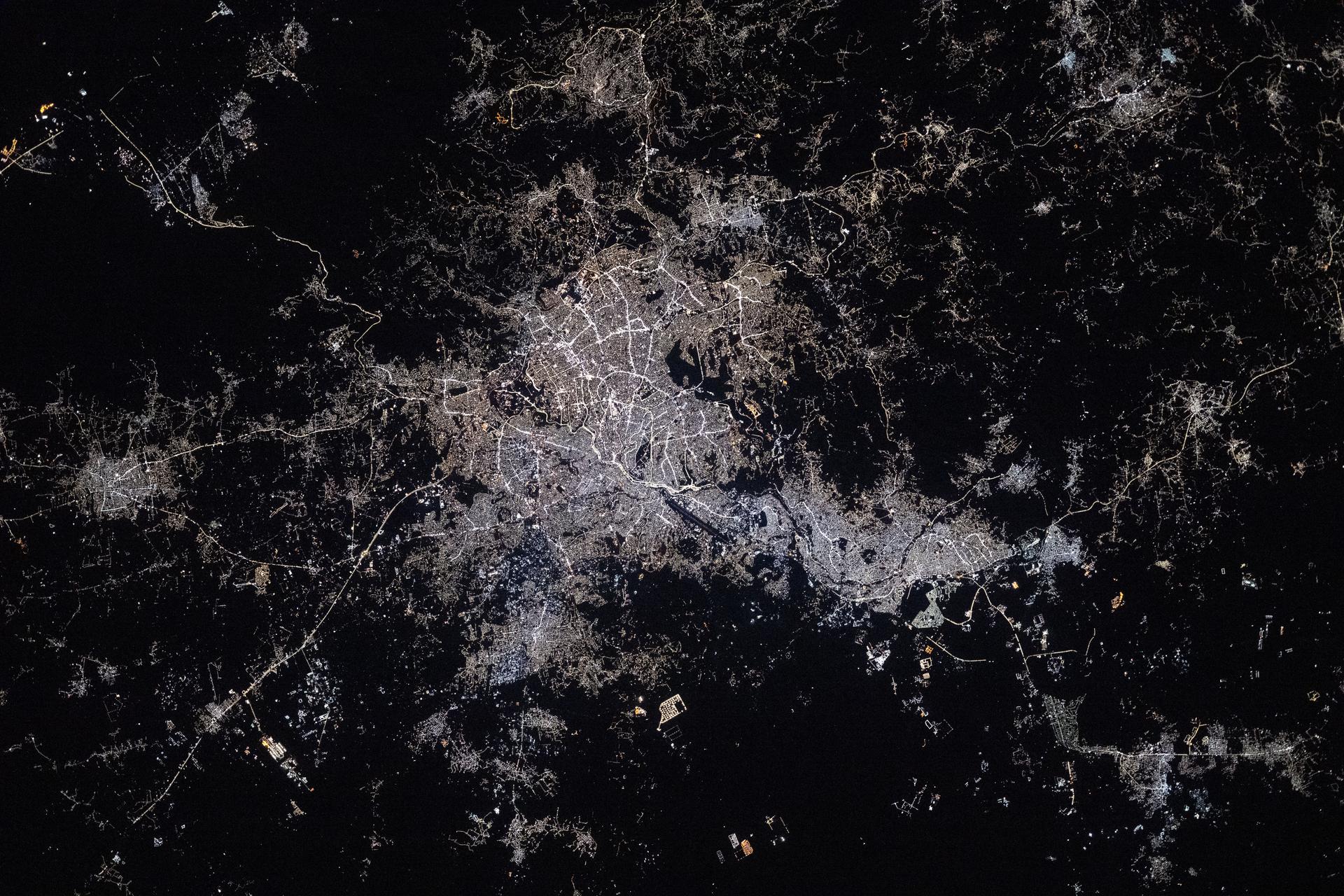 Amman, Jordan, located between the rocky desert and mountainous terrain of the Dead Sea region, has been continuously inhabited since the 8th century BC and now has a metropolitan population of about 4.9 million. The International Space Station was orbiting 263 miles above the Middle East at approximately 11:07 p.m. local time when this photograph was taken.