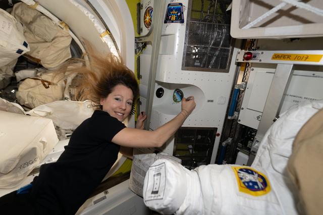ESA astronaut Sophie Adenot signs her autograph inside the International Space Station