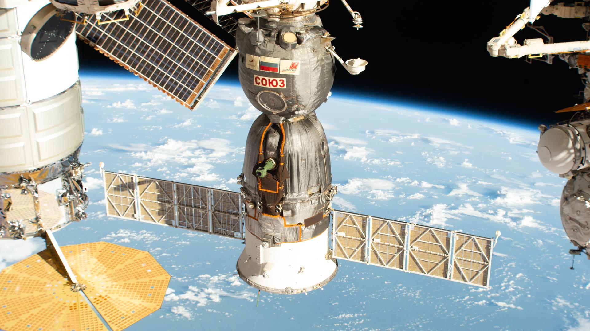 The Soyuz MS‑28 crew spacecraft, which launched and docked to the International Space Station on Nov. 25, 2025, is pictured docked to the Rassvet module. The Soyuz MS‑28 will return NASA astronaut Chris Williams and Roscosmos cosmonauts Sergey Kud‑Sverchkov and Sergei Mikaev to Earth at the end of July, completing an eight‑month space research mission.