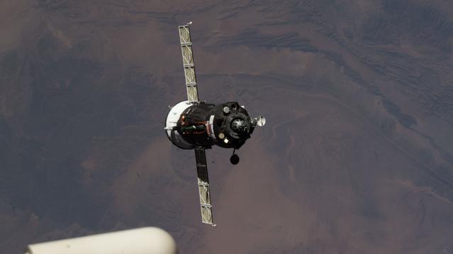 The Soyuz MS-29 spacecraft approaches the International Space Station for an automated docking