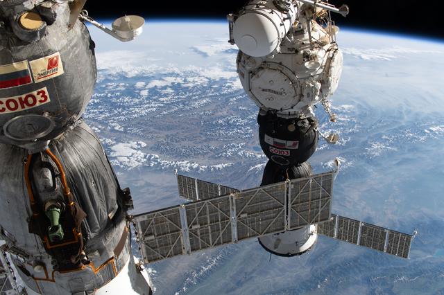 Two Soyuz crew spacecraft are pictured docked to the International Space Station