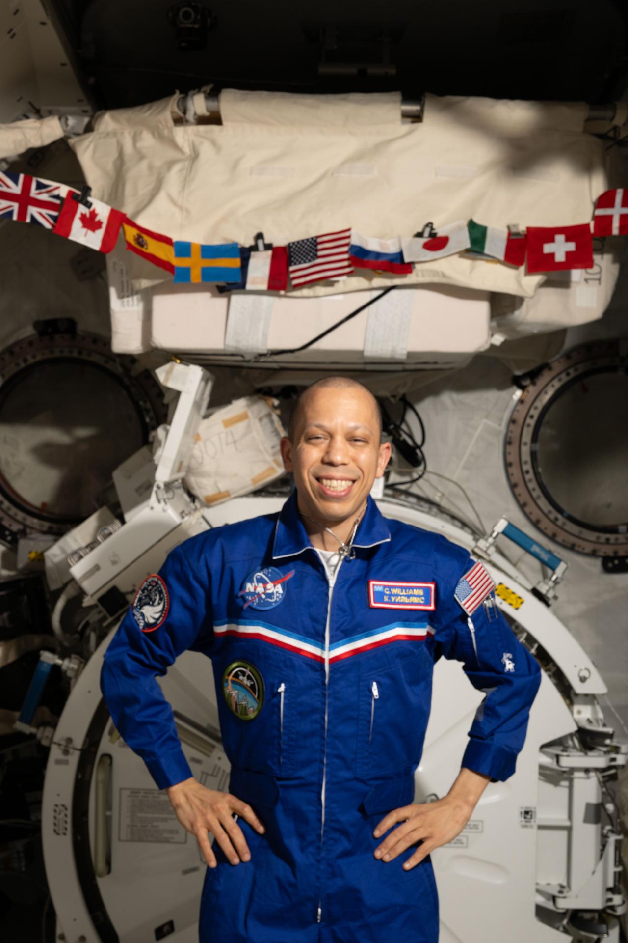 iss074e0832457 (July 25, 2026) --- NASA astronaut and Expedition 74 flight engineer Chris Williams poses for a portrait inside the International Space Station’s Kibo laboratory module the day before returning to Earth. Williams completed a 241‑day mission aboard the orbital outpost with Roscosmos cosmonauts Sergey Kud‑Sverchkov and Sergei Mikaev (both out of frame), undocking from the station aboard the Soyuz MS‑28 spacecraft and parachuting to a landing in Kazakhstan. Credit: NASA/Anil Menon