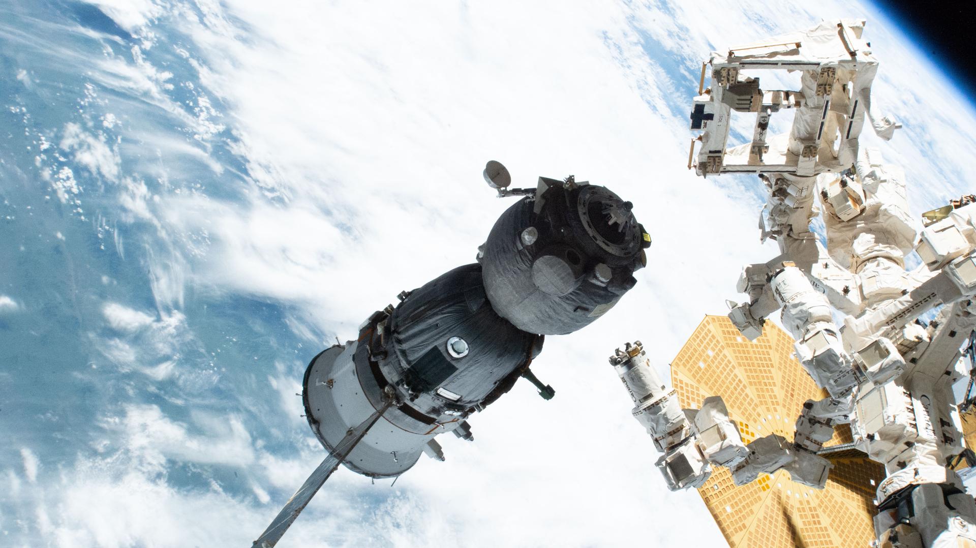 iss075e0000012 (July 26, 2026) --- The Soyuz MS-28 spacecraft backs away from the International Space Station moments after undocking from the Rassvet module. NASA astronaut Chris Williams and Roscosmos cosmonauts Sergey Kud-Sverchkov and Sergei Mikaev rode the Soyuz back to Earth and parachuted to a landing in Kazakhstan just over three hours later. Credit: NASA