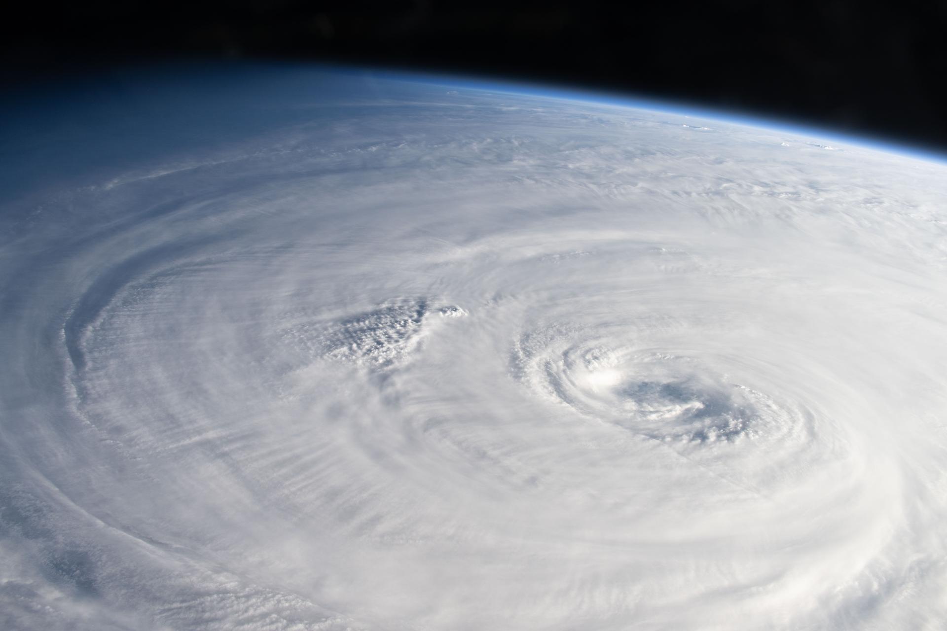Typhoon Dolphin, with its well-defined eye, is pictured as a Category 4 storm in the Pacific Ocean from the International Space Station as it orbited 264 miles above Earth.