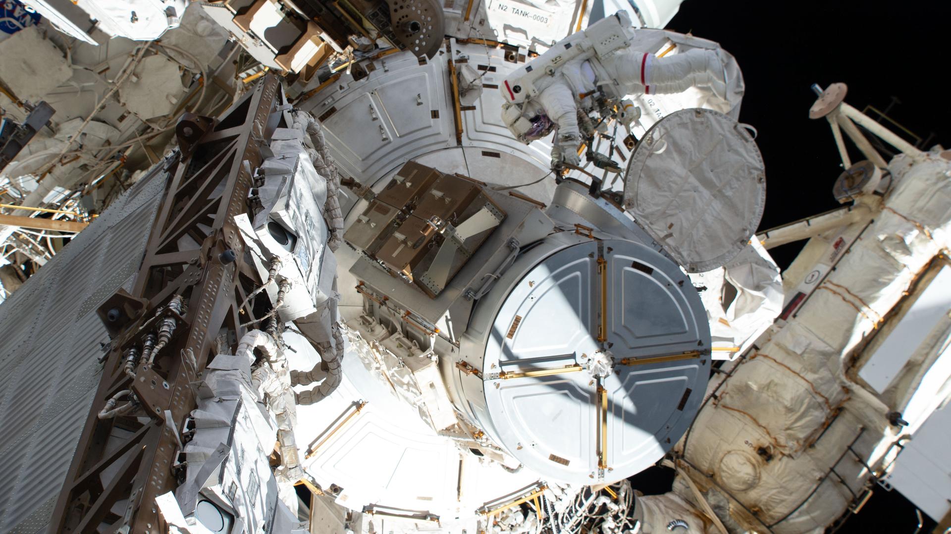 NASA astronaut and Expedition 75 commander Jessica Meir conducts a spacewalk to prepare the International Space Station for future upgrades to its power system. Meir worked in the vacuum of space for six hours and 37 minutes with Expedition 75 flight engineer Anil Menon of NASA (out of frame) building a modification kit on the station’s Starboard 6 truss segment where a roll out solar array is slated to be installed later this year.