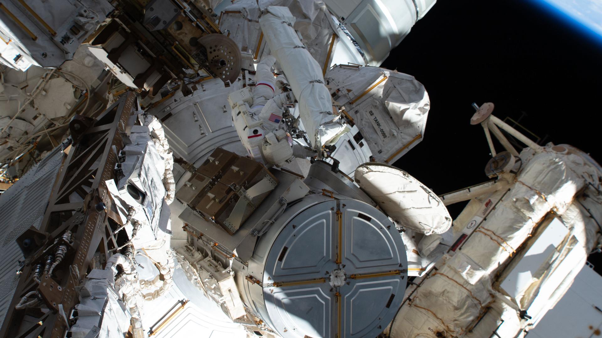 NASA astronaut and Expedition 75 commander Jessica Meir conducts a spacewalk to prepare the International Space Station for future upgrades to its power system. Meir worked in the vacuum of space for six hours and 37 minutes with Expedition 75 flight engineer Anil Menon of NASA (out of frame) building a modification kit on the station’s Starboard 6 truss segment where a roll out solar array is slated to be installed later this year.