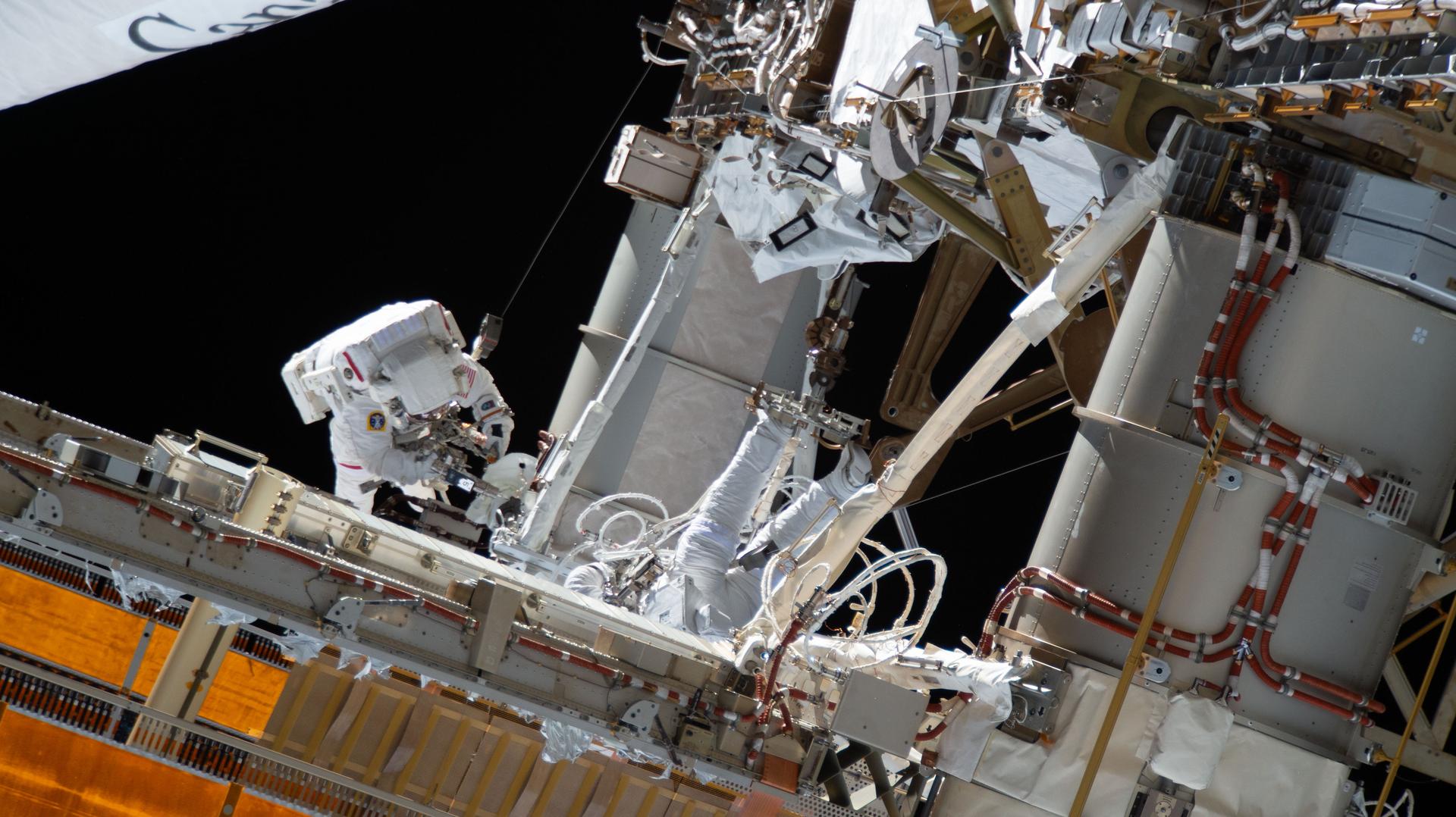 NASA astronaut and Expedition 75 commander Jessica Meir conducts a spacewalk to prepare the International Space Station for future upgrades to its power system. Meir worked in the vacuum of space for six hours and 37 minutes with Expedition 75 flight engineer Anil Menon of NASA (out of frame) building a modification kit on the station’s Starboard 6 truss segment where a roll out solar array is slated to be installed later this year.