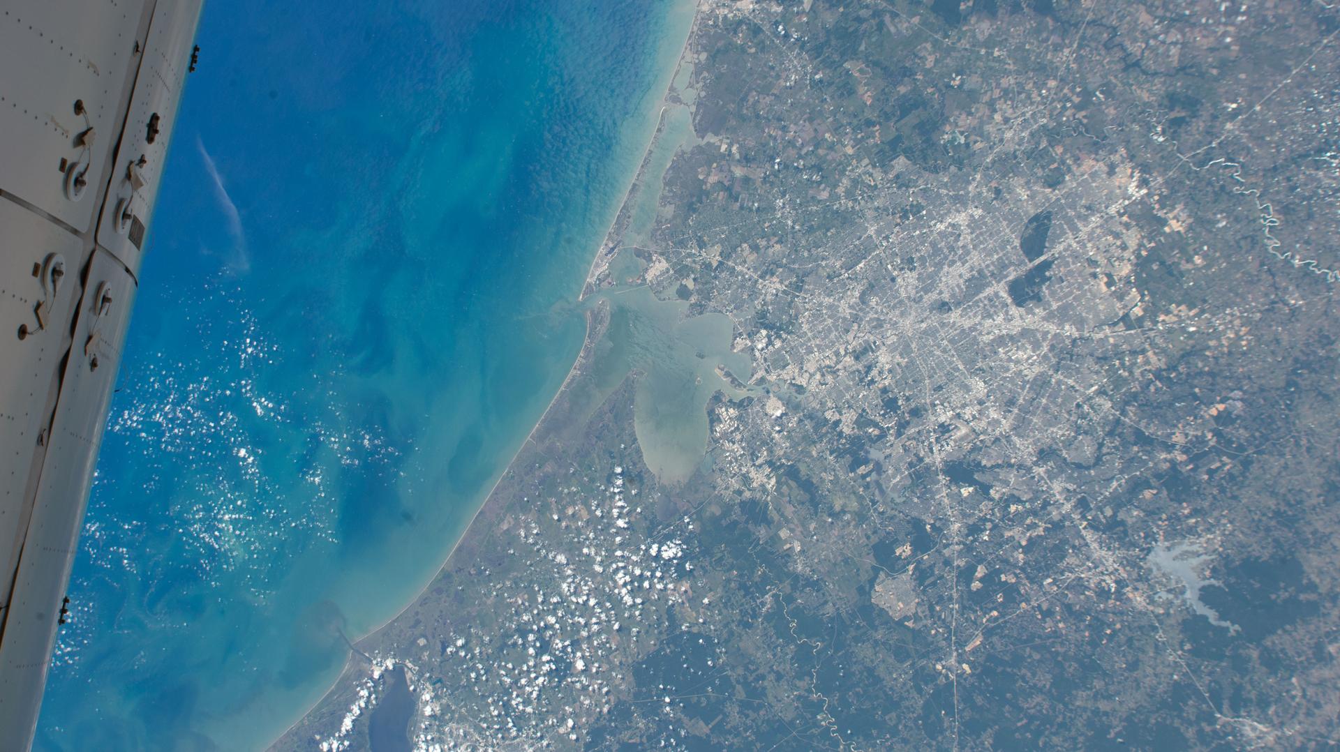 Houston, Texas, the home of NASA's Johnson Space Center near Galveston Bay (center), is pictured from the International Space Station as it orbited 260 miles above the Lone Star State.