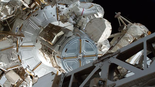 NASA spacewalker Anil Menon exits the International Space Station’s Quest airlock