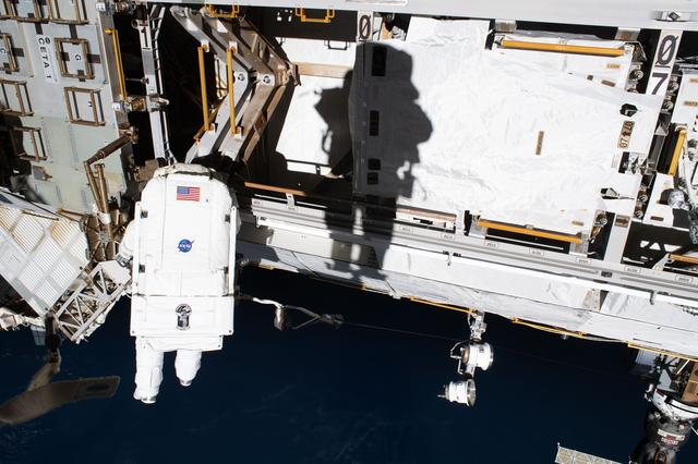 ESA astronaut Sophie Adenot is tethered to the International Space Station during a spacewalk
