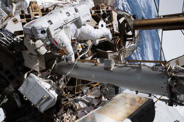 ESA astronaut Sophie Adenot is tethered to the International Space Station during a spacewalk