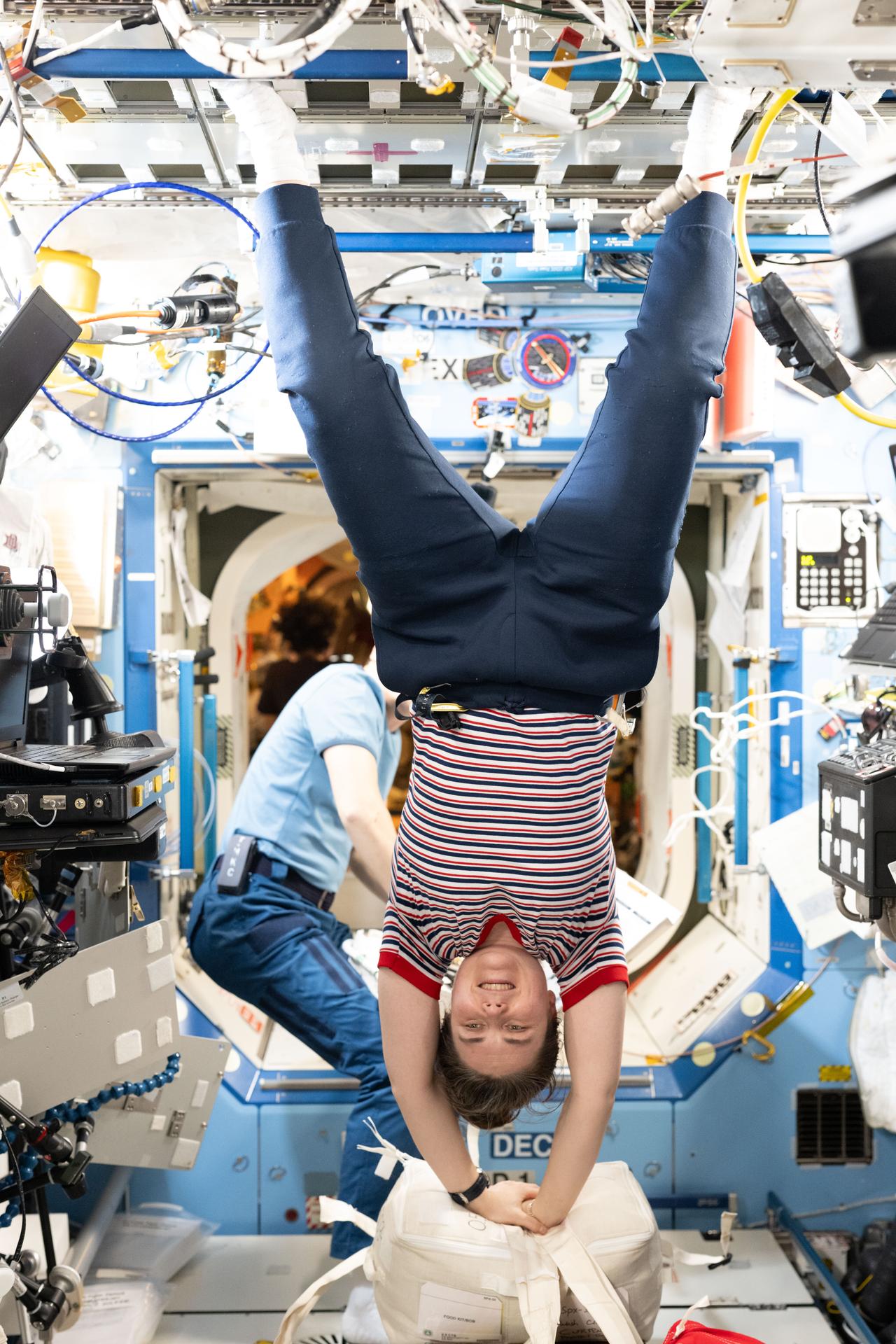 Roscosmos cosmonaut and Expedition 75 flight engineer Anna Kikina practices CPR in the weightless environment of the International Space Station. Performing chest compressions in microgravity requires securing the patient with restraints while the crew member braces their feet against a fixed surface to generate effective force.