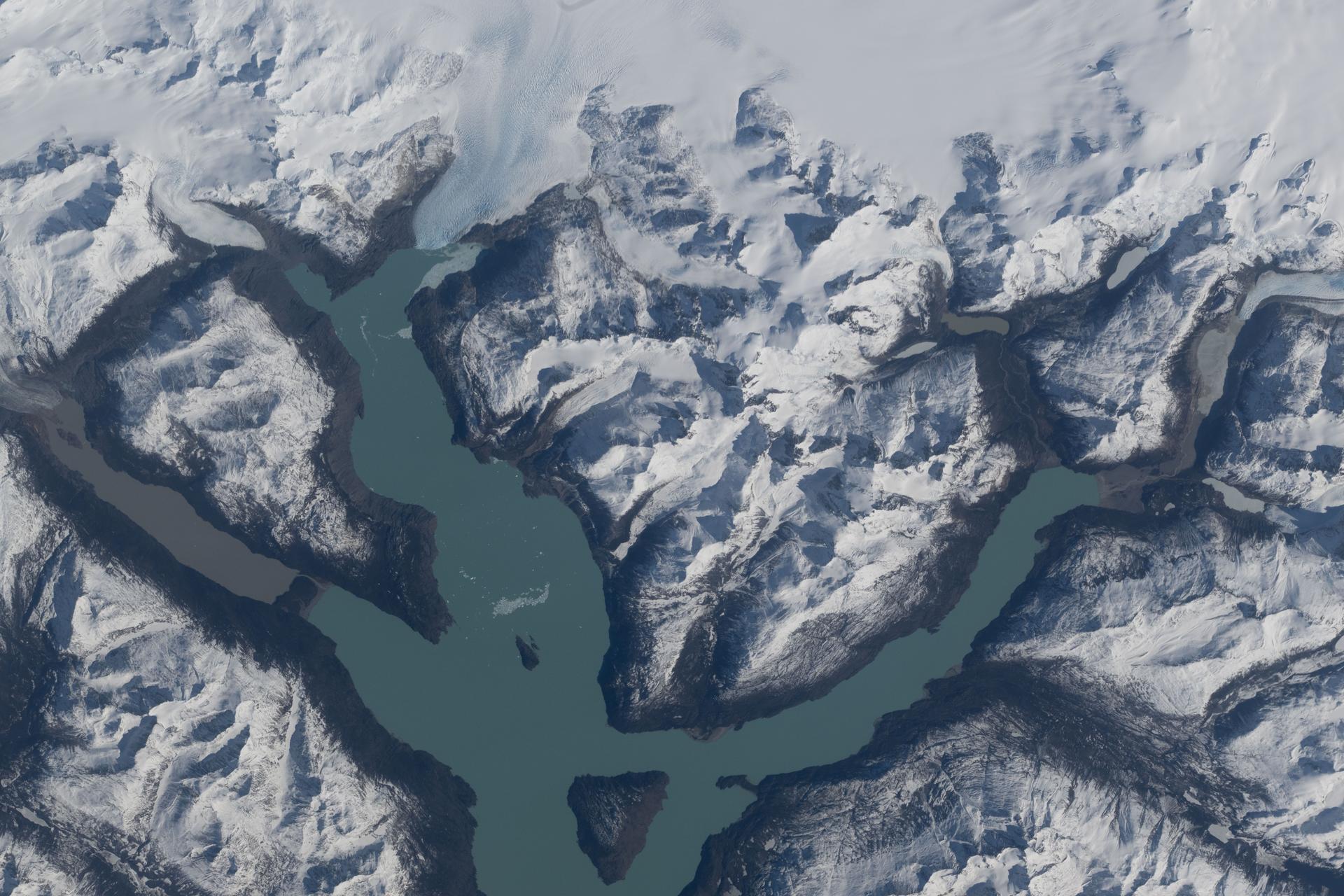 iss075e0088834 (Sept. 5, 2026) --- Lago San Martín, with its long, narrow arms, extends into glacially carved valleys in Chile’s Patagonia region, a landscape known for its year‑round harsh, windy, and cold climate. The International Space Station was orbiting 272 miles above South America when this photograph was taken. Credit: NASA/Jessica Meir