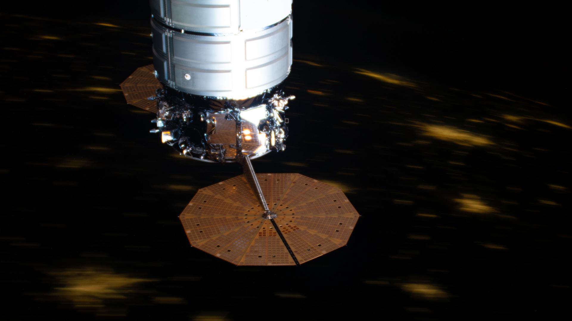 iss075e0091367 (Sept. 9, 2026) --- A portion of Northrop Grumman’s Cygnus XL cargo spacecraft, with its prominent cymbal‑shaped UltraFlex solar arrays, is pictured as the International Space Station orbited above the United States at approximately 9:56 p.m. local time. Credit: NASA