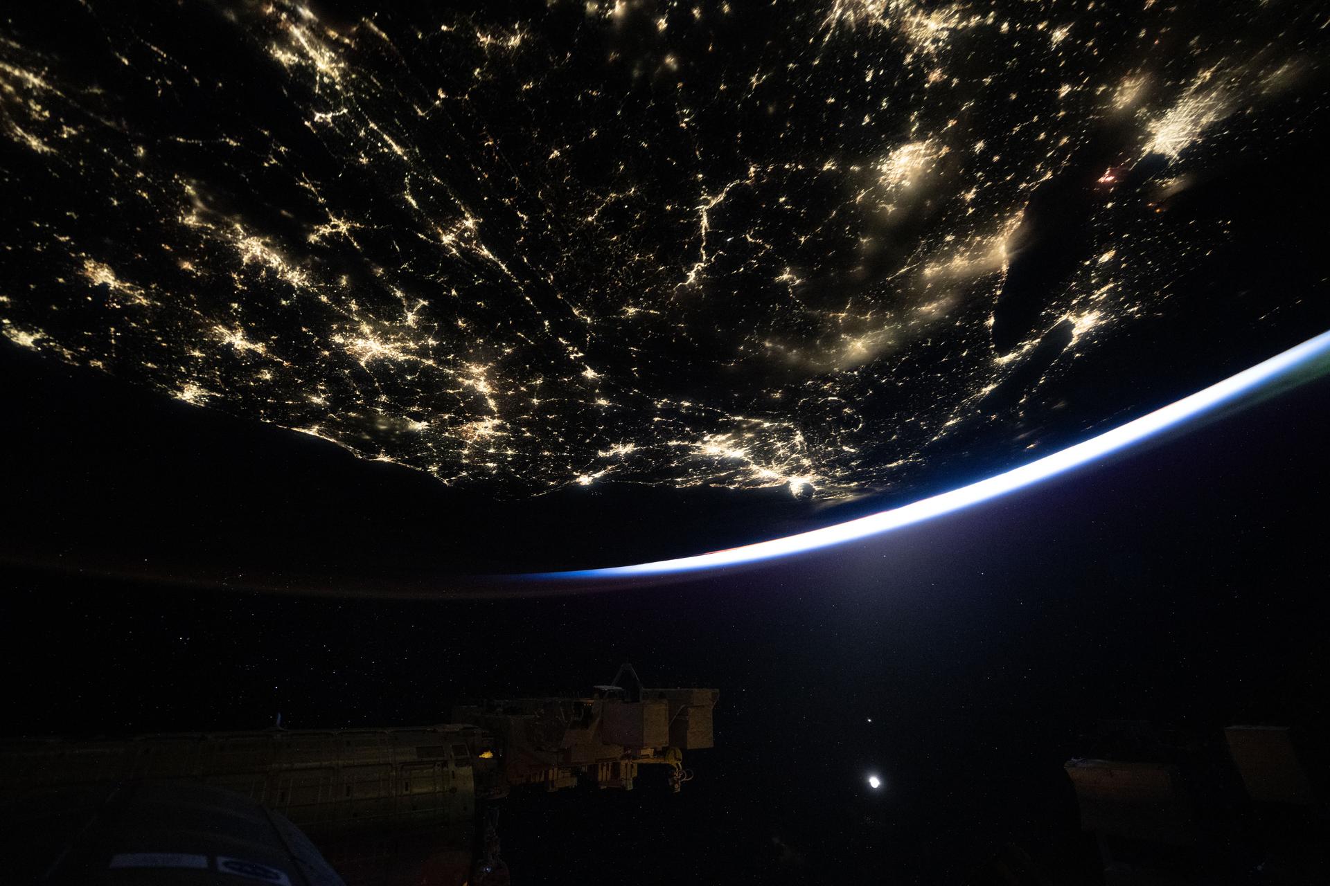 This nighttime view of the United States, dotted with city lights looking toward New York City (center), was taken at approximately 3:40 a.m. local time from the International Space Station as it orbited 259 miles above Earth.