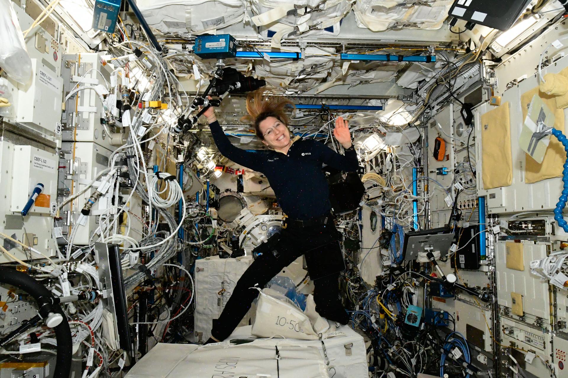 ESA (European Space Agency) astronaut and Expedition 75 flight engineer Sophie Adenot poses for a portrait inside the International Space Station's Kibo laboratory module.