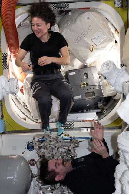 NASA astronauts Jessica Meir and Jack Hathaway relax inside the International Space Station