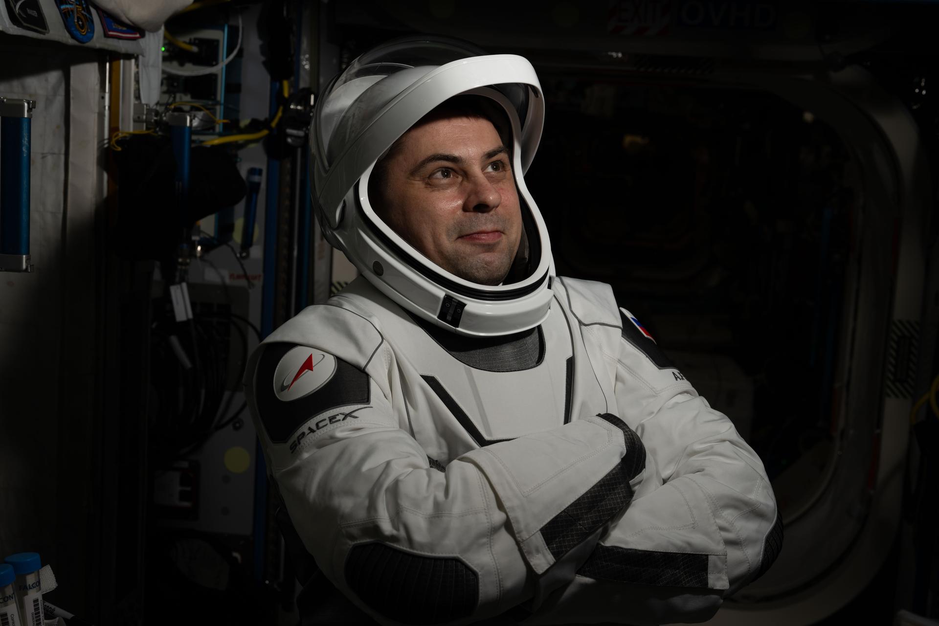 Roscosmos cosmonaut and NASA's SpaceX Crew-12 mission specialist Andrey Fedyaev poses for a portrait while wearing the pressure suit he will wear when he departs the International Space Station inside the SpaceX Dragon spacecraft.