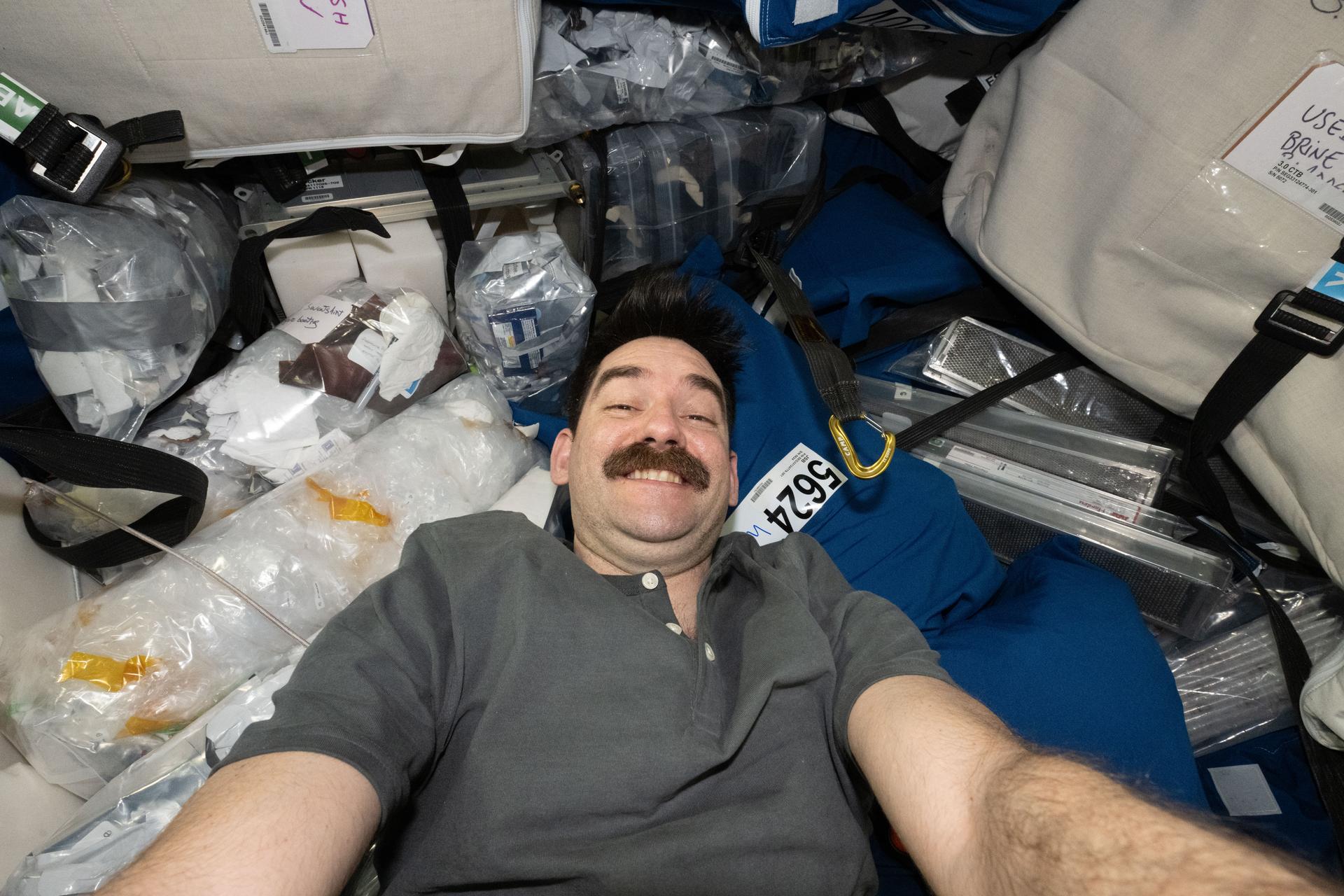 iss075e0161437 (Oct. 5, 2026) --- NASA astronaut and Expedition 75 flight engineer Jack Hathaway takes a selfie inside Northrop Grumman's Cygnus XL cargo spacecraft during cargo transfer activities. Credit: NASA/Jack Hathaway