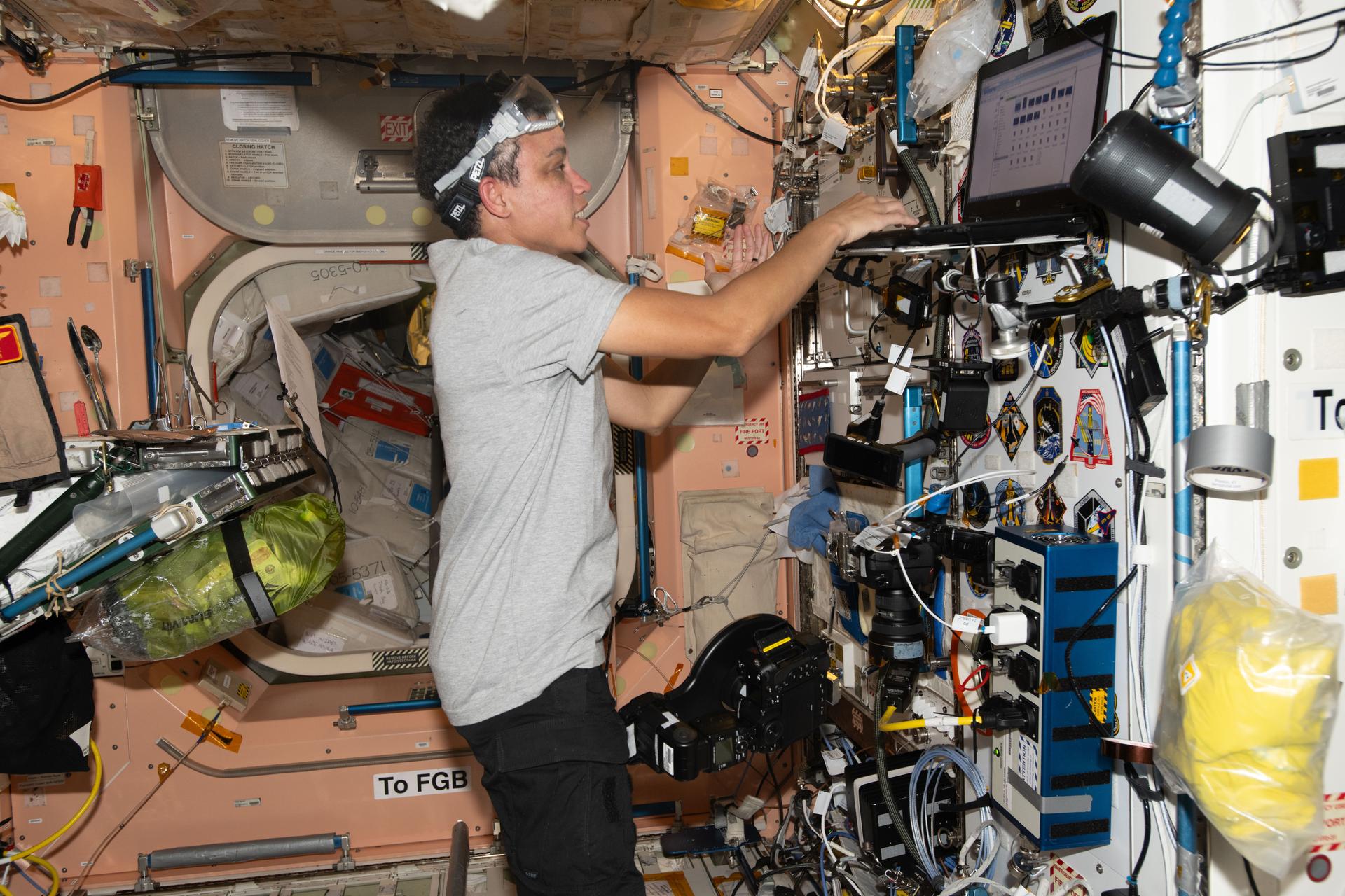 NASA astronaut and Expedition 75 flight engineer Jessica Watkins wraps up her shift inside the International Space Station's Unity module after a busy schedule of 3D bioprinting research, orbital plumbing duties, and preparations for the release of Northrop Grumman's Cygnus XL cargo spacecraft.