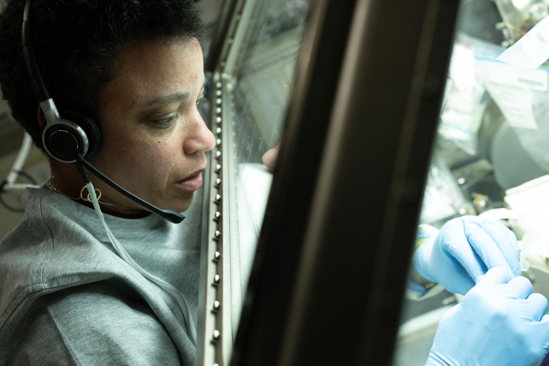 NASA astronaut and Expedition 75 flight engineer Jessica Watkins works in the Kibo laboratory module's Life Science Glovebox, safely mixing living cell samples with a bioink and then filling a special cartridge with the cell‑ink mixture. The advanced research operations were part of the InSPA‑Auxilium Bioprinter‑Cell Printing investigation, which explores 3D bioprinting cartilage tissue in microgravity of higher quality than that produced on Earth. Results may advance the ability to biomanufacture cartilage, benefiting patients on Earth and crew members on long‑duration space missions.
