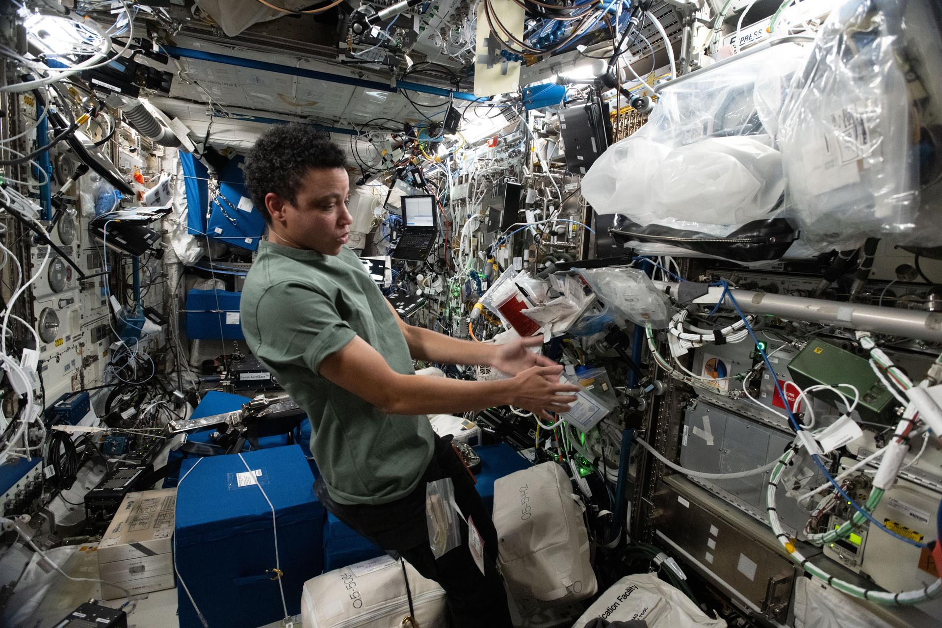 NASA astronaut and Expedition 75 flight engineer Jessica Watkins configures the BioFabrication Facility in the Columbus laboratory module to print blood vessels made from the cells of patients with a rare genetic disorder that causes rapid aging. Observations in weightlessness may provide deeper insights into the cellular affliction possibly leading to advanced therapies for the accelerated aging disease.