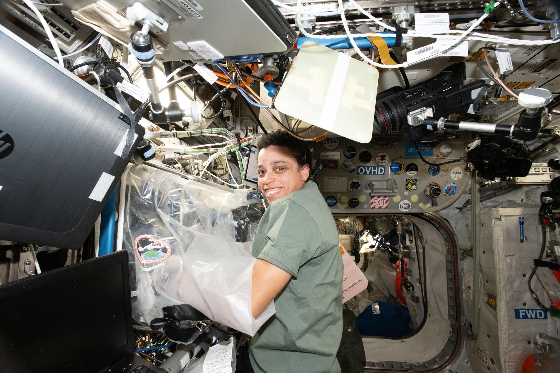 NASA astronaut and Expedition 75 flight engineer Jessica Watkins configures the BioFabrication Facility in the Columbus laboratory module to print blood vessels made from the cells of patients with a rare genetic disorder that causes rapid aging. Observations in weightlessness may provide deeper insights into the cellular affliction possibly leading to advanced therapies for the accelerated aging disease.