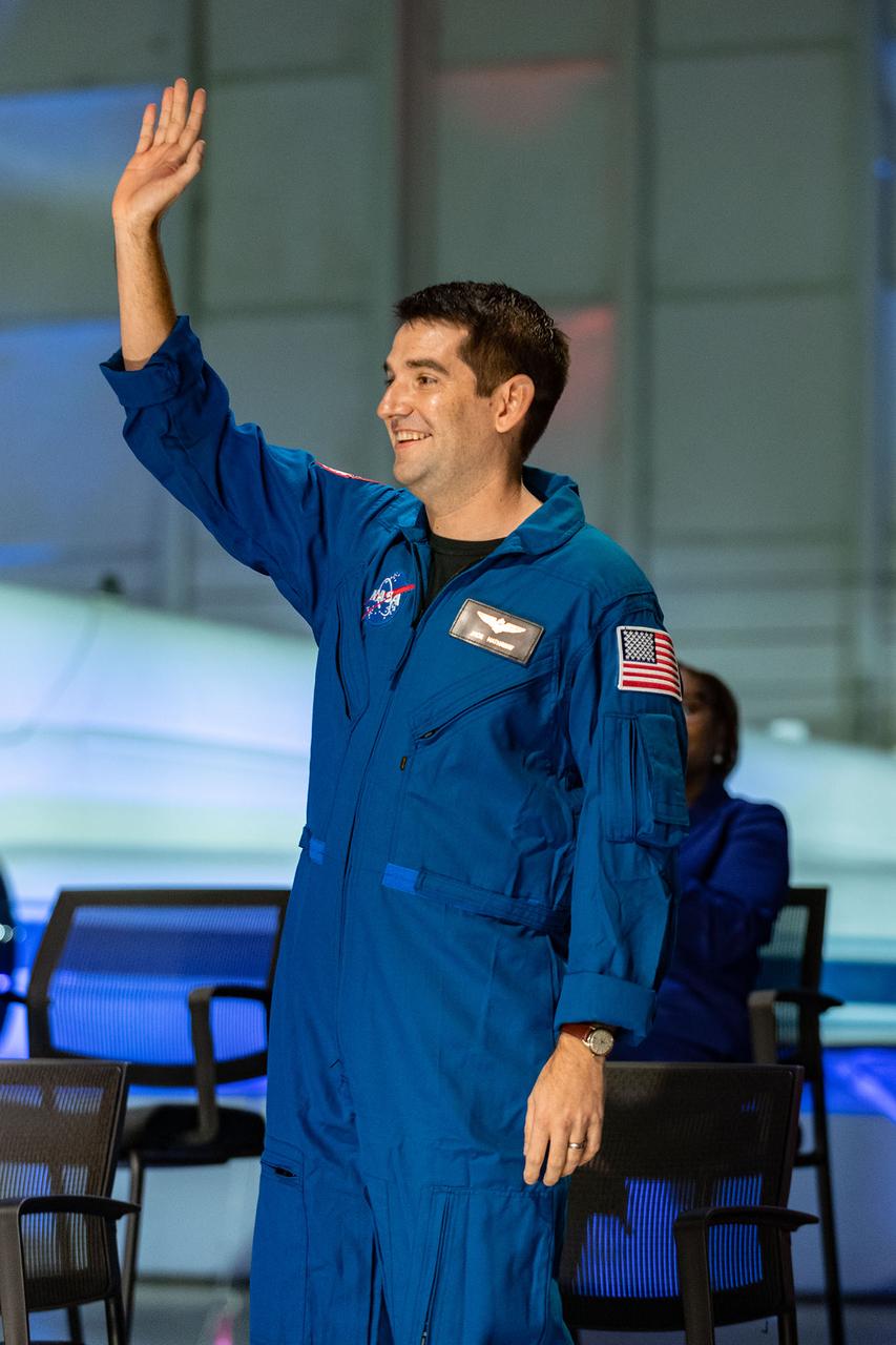 Photo Date: 2021-12-06 Subject:  NASA announced its 2021 astronaut candidate class on Dec. 6, 2021. The 10 candidates, pictured here in an event at Ellington Field near NASA’s Johnson Space Center in Houston are Nichole Ayers, Christopher Williams, Luke Delaney, Jessica Wittner, Anil Menon, Marcos Berríos, Jack Hathaway, Christina Birch, Deniz Burnham, and Andre Douglas.   NASA’s new astronaut candidates will begin about two years of training in January 2022, after which they could be assigned to missions performing research on the International Space Station, launching from American soil on spacecraft built by commercial companies, and launching on Artemis missions to the Moon on NASA’s new Orion spacecraft and Space Launch System rocket.  Location: Ellington Hangar 135 Photographer: James Blair