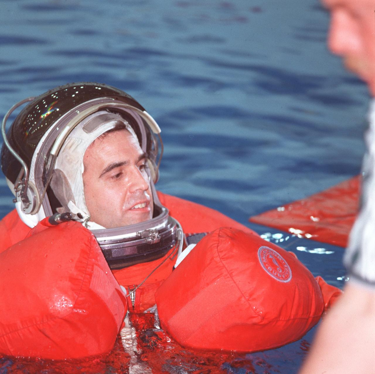 JSC2000-02523 (21 March 2000) --- Astronaut Richard A. Mastracchio, STS-106 mission specialist, depends on his &quot;Mae West&quot; preserver to keep him afloat as he deploys his life raft during an emergency bailout exercise in the Neutral Buoyancy Laboratory (NBL).  Mastracchio, an alumnus of NASA 1996 class of astronaut candidates, will join four other astronauts and two cosmonauts, representing the Russian Aviation and Space Agency, for a late summer visit to the International Space Station.