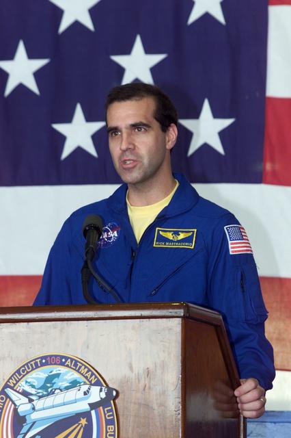 JSC2000-E-23457 (21 September 2000) --- Astronaut Richard A. Mastracchio, STS-106 mission specialist, addresses the crowd that visited Ellington Field's Hangar 990 to welcome home the STS-106 astronauts and cosmonauts.  The seven-man crew landed approximately 24 hours earlier in Florida, wrapping up a 4.9 million-mile mission in which more than three tons of equipment were delivered to the international outpost.