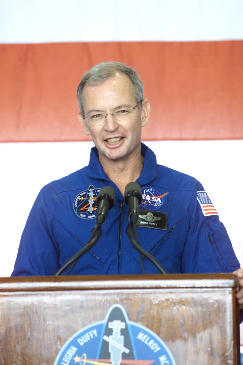 JSC2000-E-27051 (27 October 2000) --- Astronaut Brian Duffy, STS-92 commander, addresses crowd at Ellington Field during crew return ceremonies.