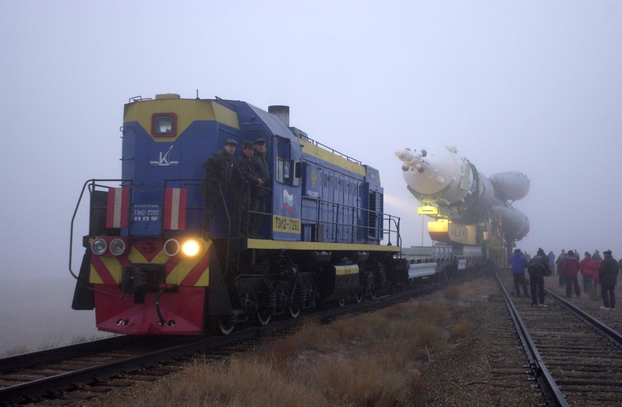 JSC2000-E-28199 (29 October 2000) ---  A train engine transports the Soyuz rocket from the assembly building toward the launch pad at the Baikonur complex in Kazakhstan.