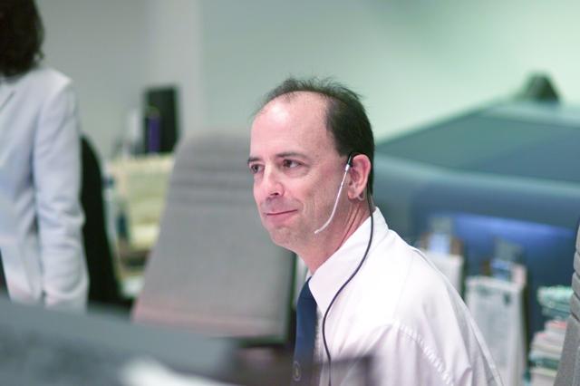 JSC2001-E-25126 (16 August 2001) --- ISS flight director Mark Ferring monitors data at his console in the station flight control room (BFCR) in Houston&#0146;s Mission Control Center (MCC) during the first of two scheduled space walks on Discovery&#0146;s voyage to the International Space Station (ISS).