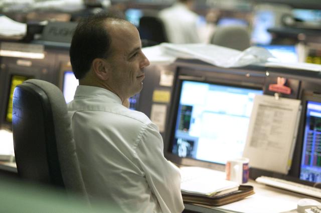 JSC2001-E-25130 (16 August 2001) --- ISS flight director Mark Ferring monitors data at his console in the station flight control room (BFCR) in Houston&#0146;s Mission Control Center (MCC) during the first of two scheduled space walks during Discovery&#0146;s voyage to the International Space Station (ISS).